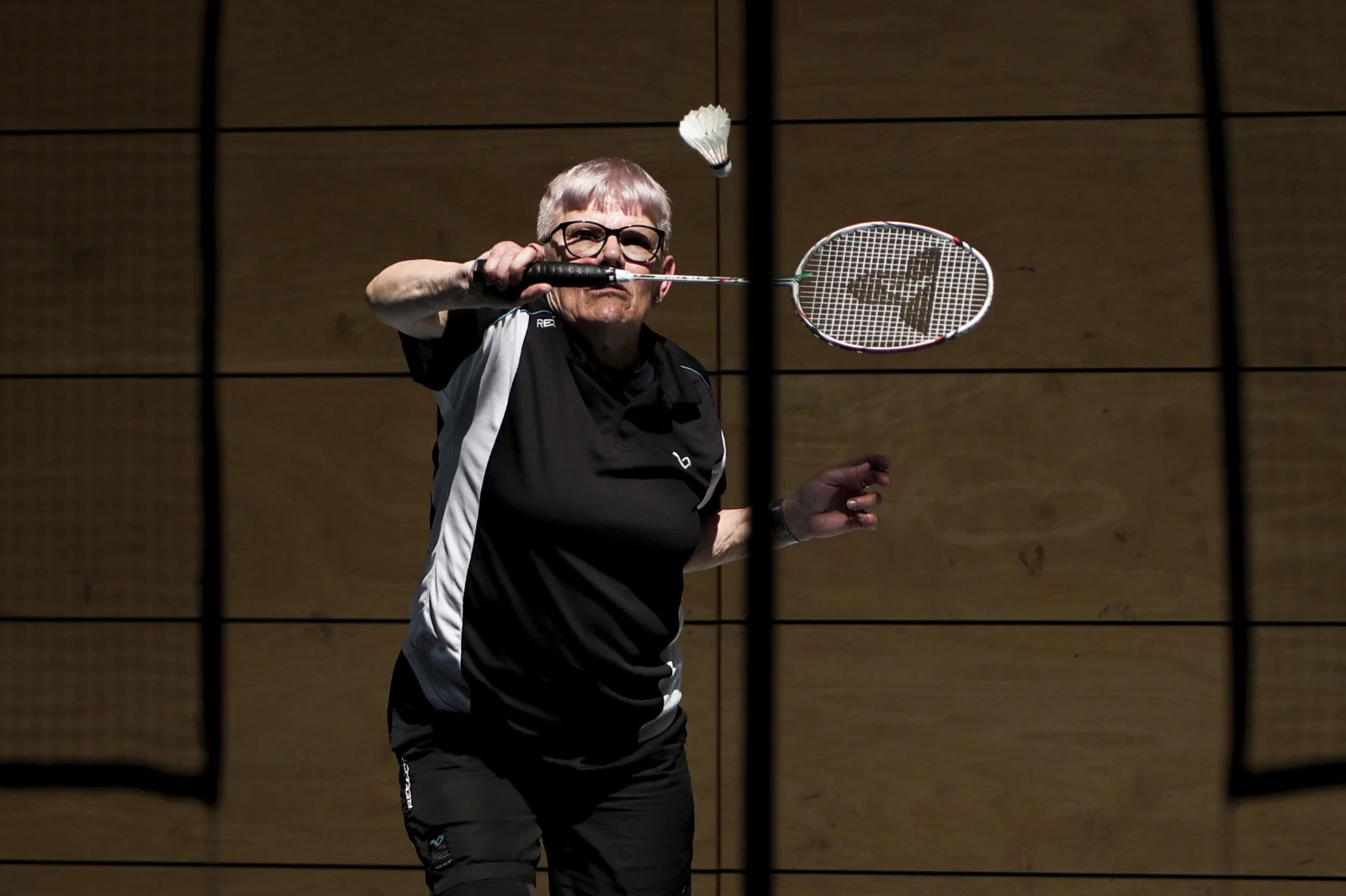Badminton – Spielerin beim Schlag – Fotografie Anastasia Hrytsenko